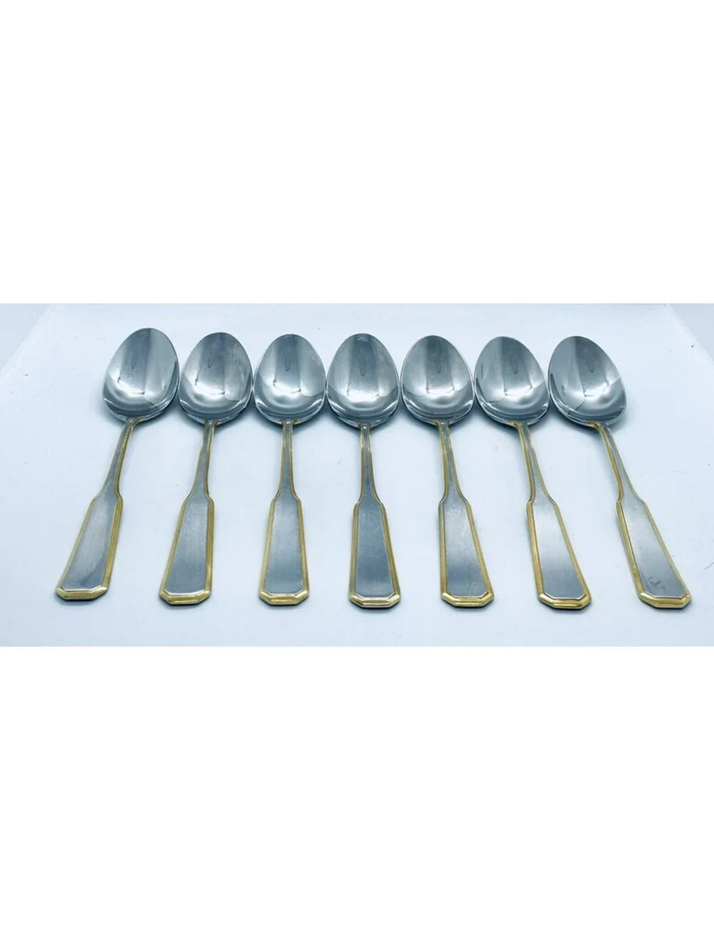 (7) Oxford Hall Stainless Japan Golden Coppelia Place/Oval Soup Spoon Lot 7 3/8”